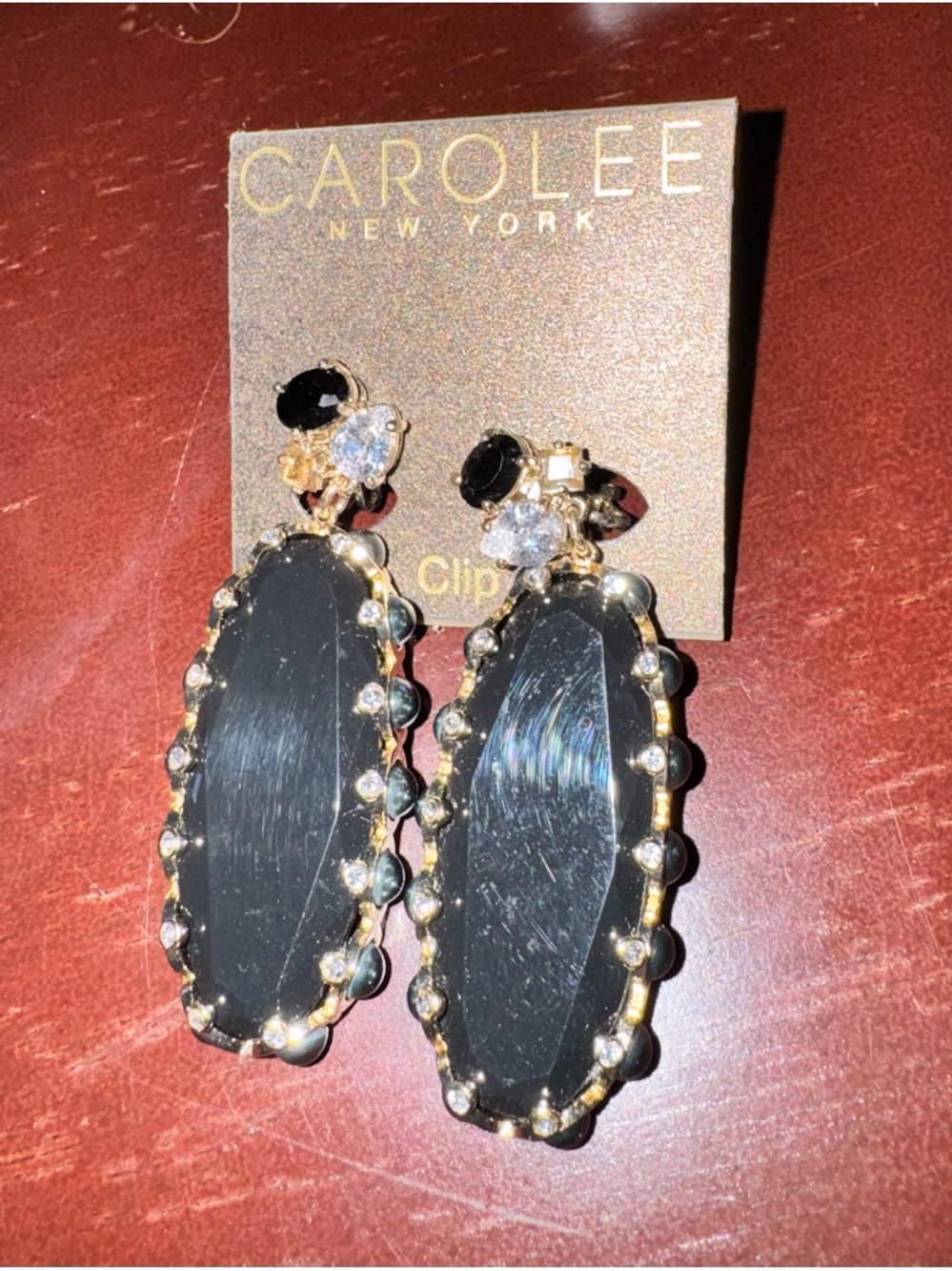 Carolee Black and Gold Oval Dangle Clip-On Earrings